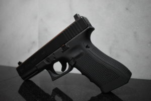 Glock 17 grey Cerakote Trijicon supressor height night sights